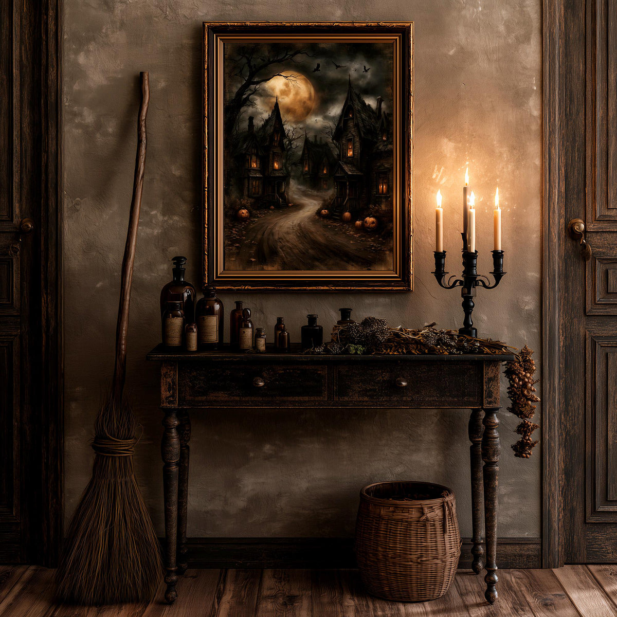 Gothic village artwork above a candelabra and a leaning broom in a dark room