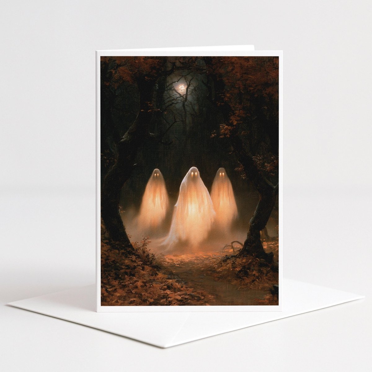 Three glowing ghosts drifting through a moonlit autumn forest, Halloween note card art