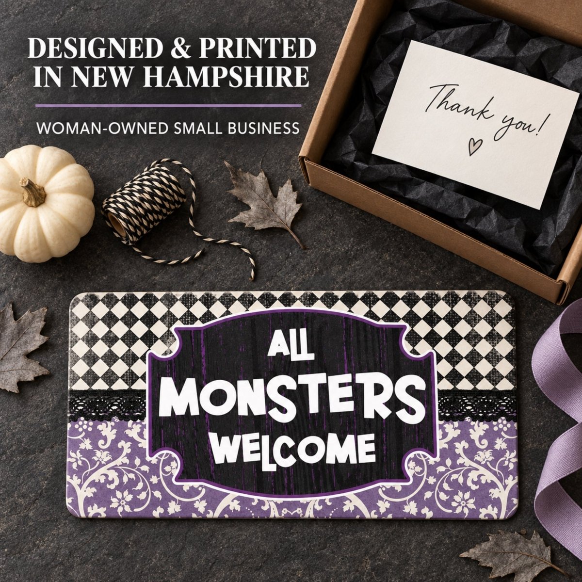 Purple All Monsters Welcome sign packaged as a gift with a thank you note