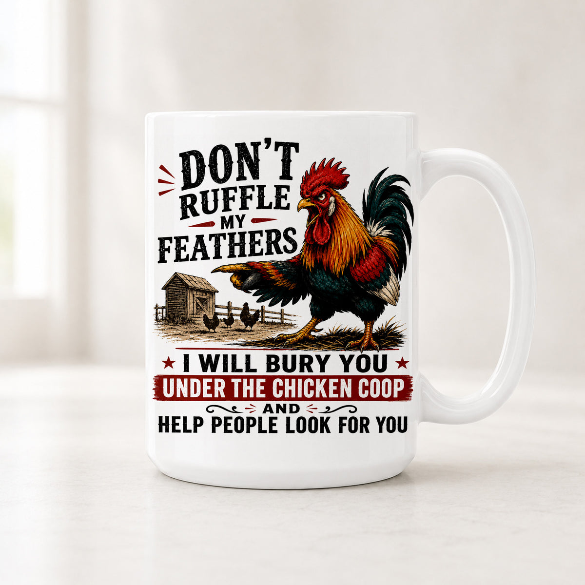 White rooster mug with a pointing rooster, a coop and hens under Don't Ruffle My Feathers in black and red