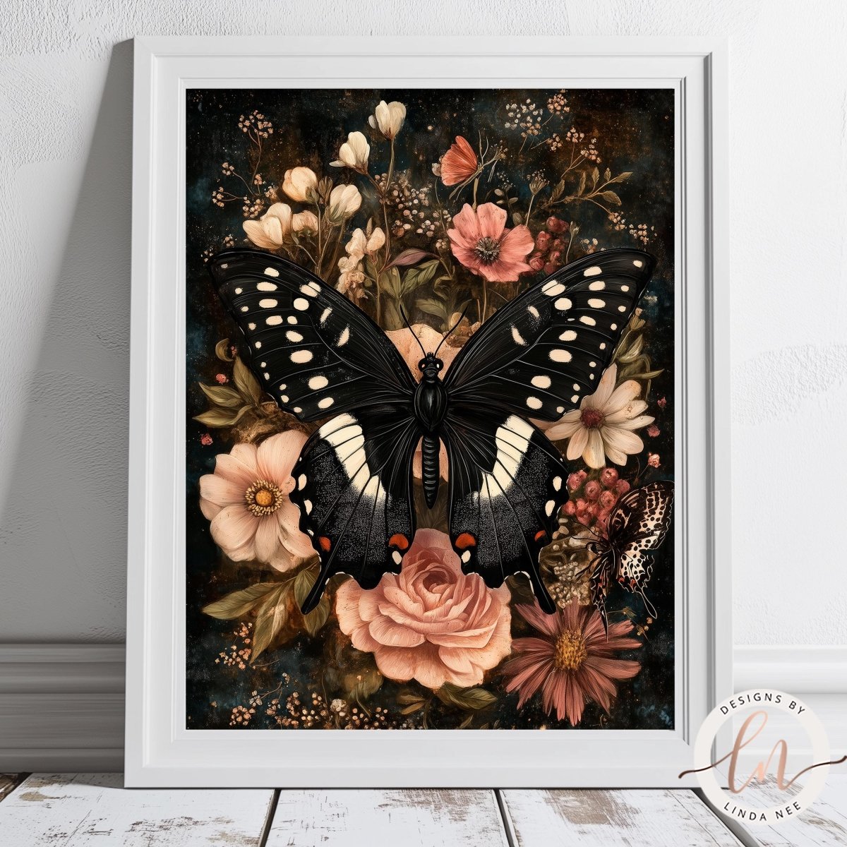 A framed print depicting a black butterfly with white spots, surrounded by a vibrant floral arrangement of pink and white flowers, including roses and other blooms.