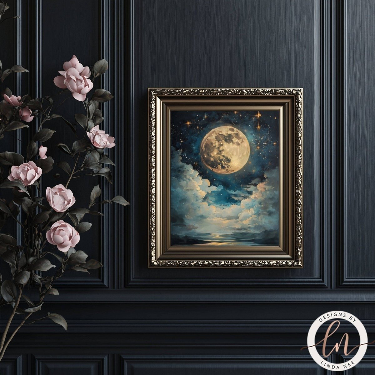 Golden moon art print displayed on a wall beside pink roses