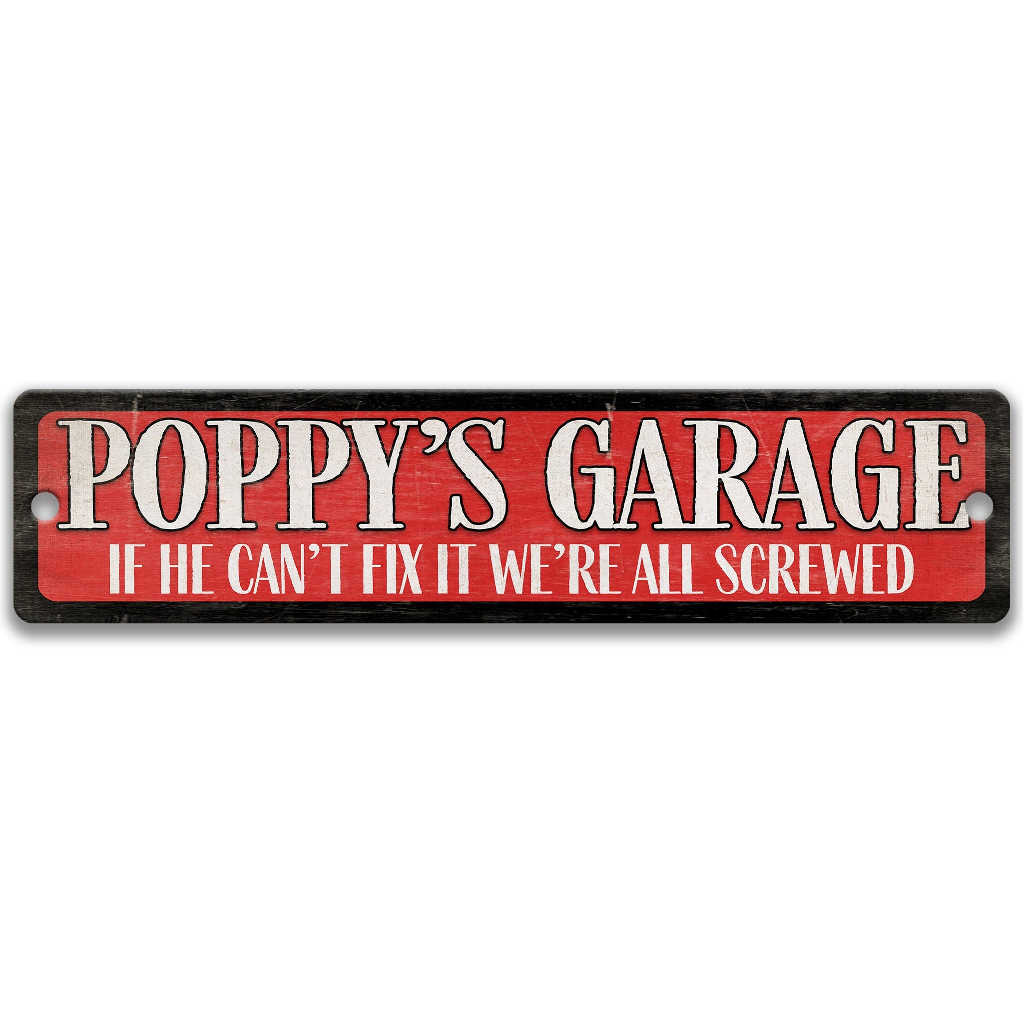 a sign with the text "POPPY'S GARAGE" in bold red letters.