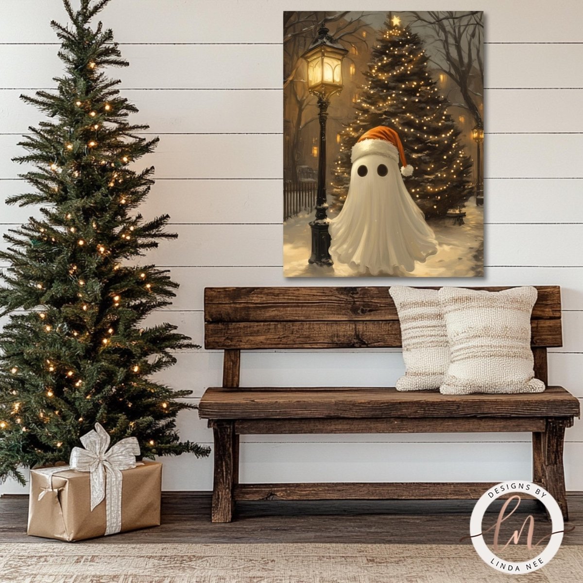 Christmas ghost artwork shown above a wooden bench beside a decorated tree