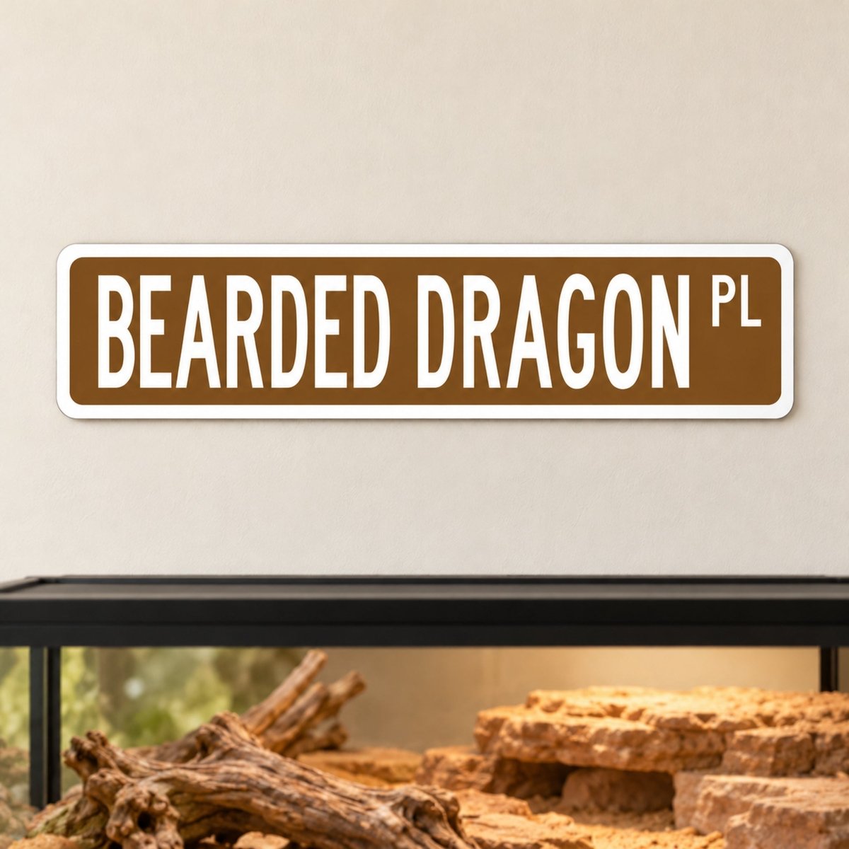Bearded Dragon street sign with a brown background reading BEARDED DRAGON PL, hanging on a wall