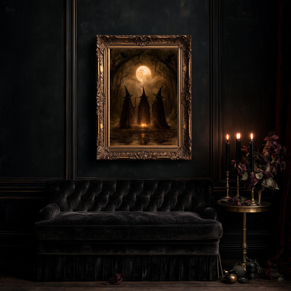 Large three witches art print above a black tufted sofa and a table of lit candles