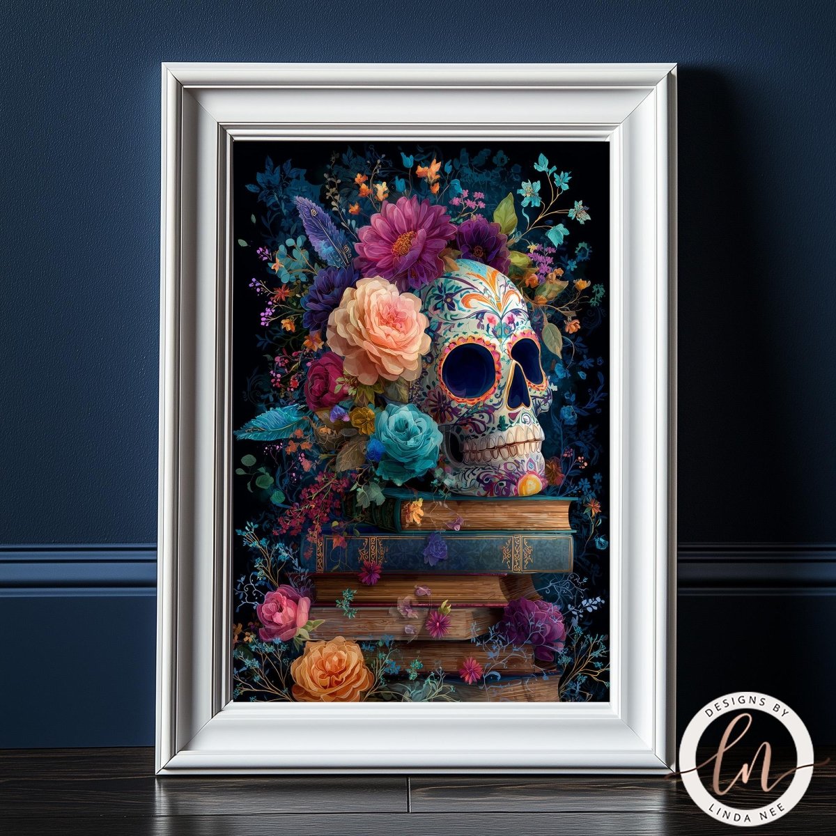 A framed artwork depicting a colorful skull surrounded by a vibrant floral arrangement, with books below it.