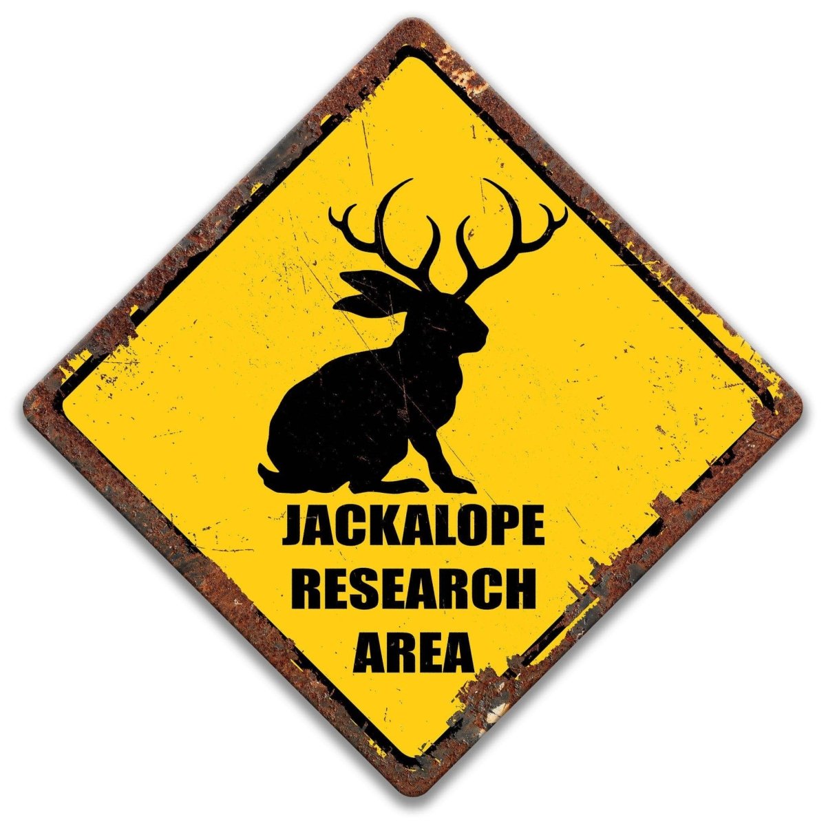 a yellow diamond-shaped sign with a black silhouette of a rabbit or deer with antlers, and the text "JACKALOPE RESEARCH AREA" below it.