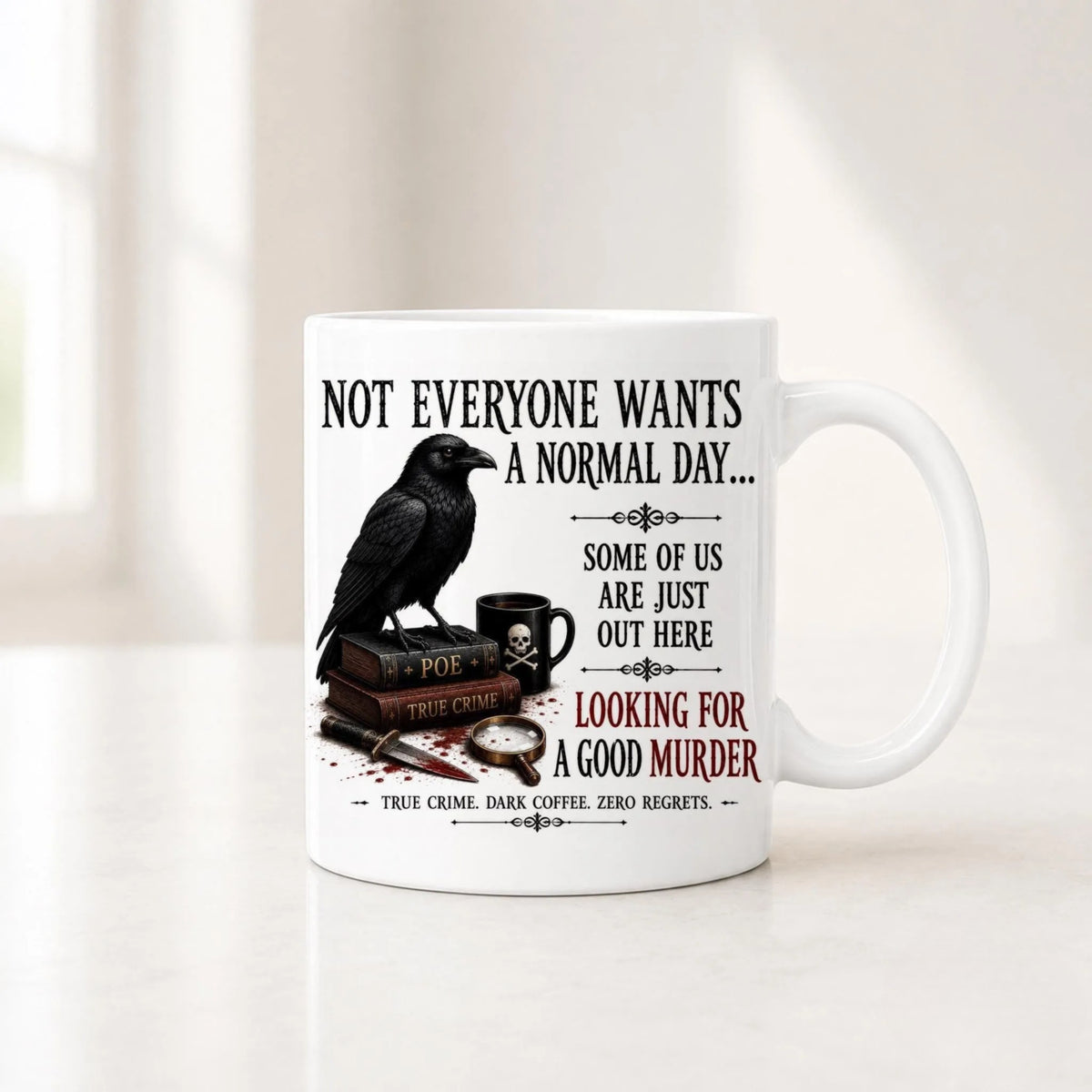 Second view of the white true crime raven mug with a skull mug, a dagger and a magnifying glass under the quote