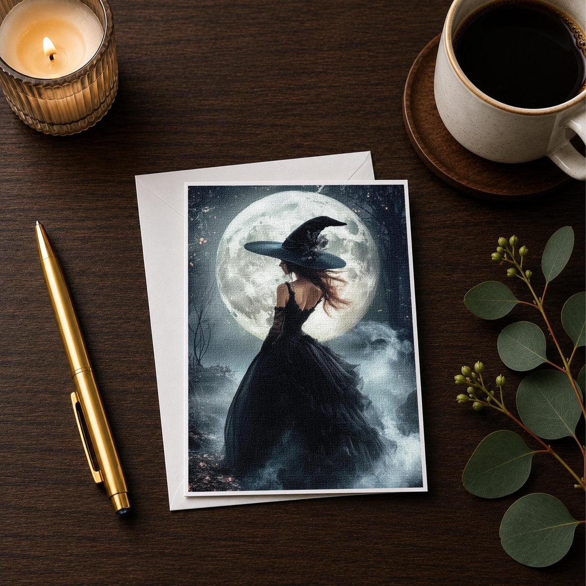 Moonlit witch note card styled on a wooden desk with a candle and a coffee cup