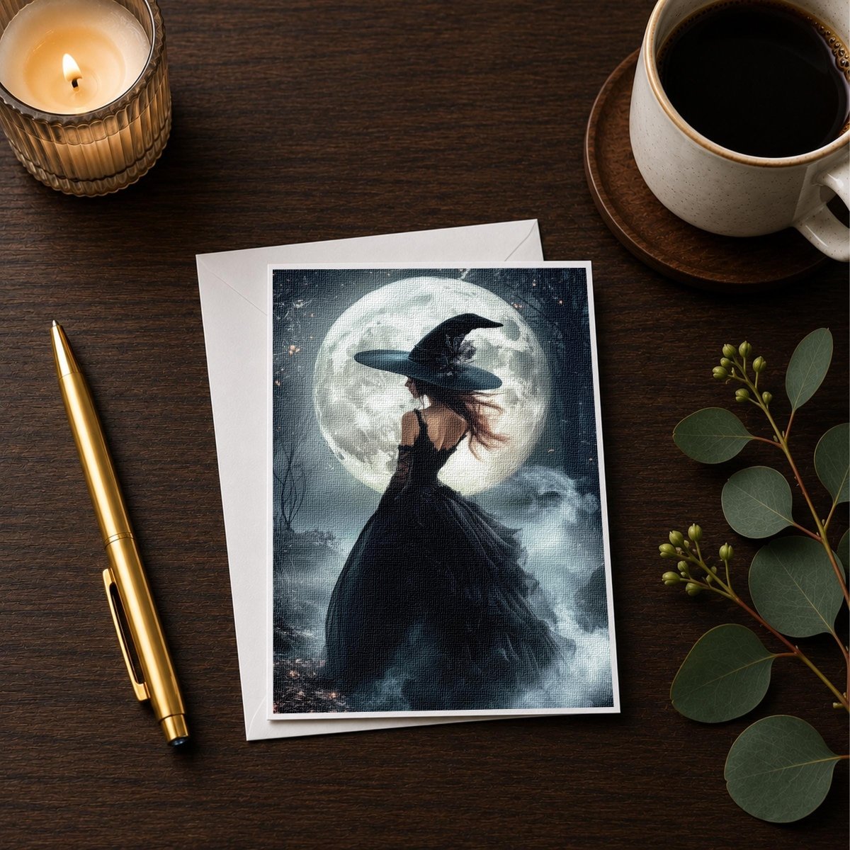 Moonlit witch note card styled on a wooden desk with a candle and a coffee cup