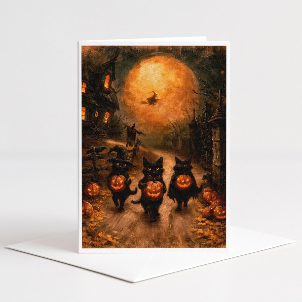 Black Cat Parade Halloween note card art of three black cats carrying jack o lanterns under a full moon with a flying witch