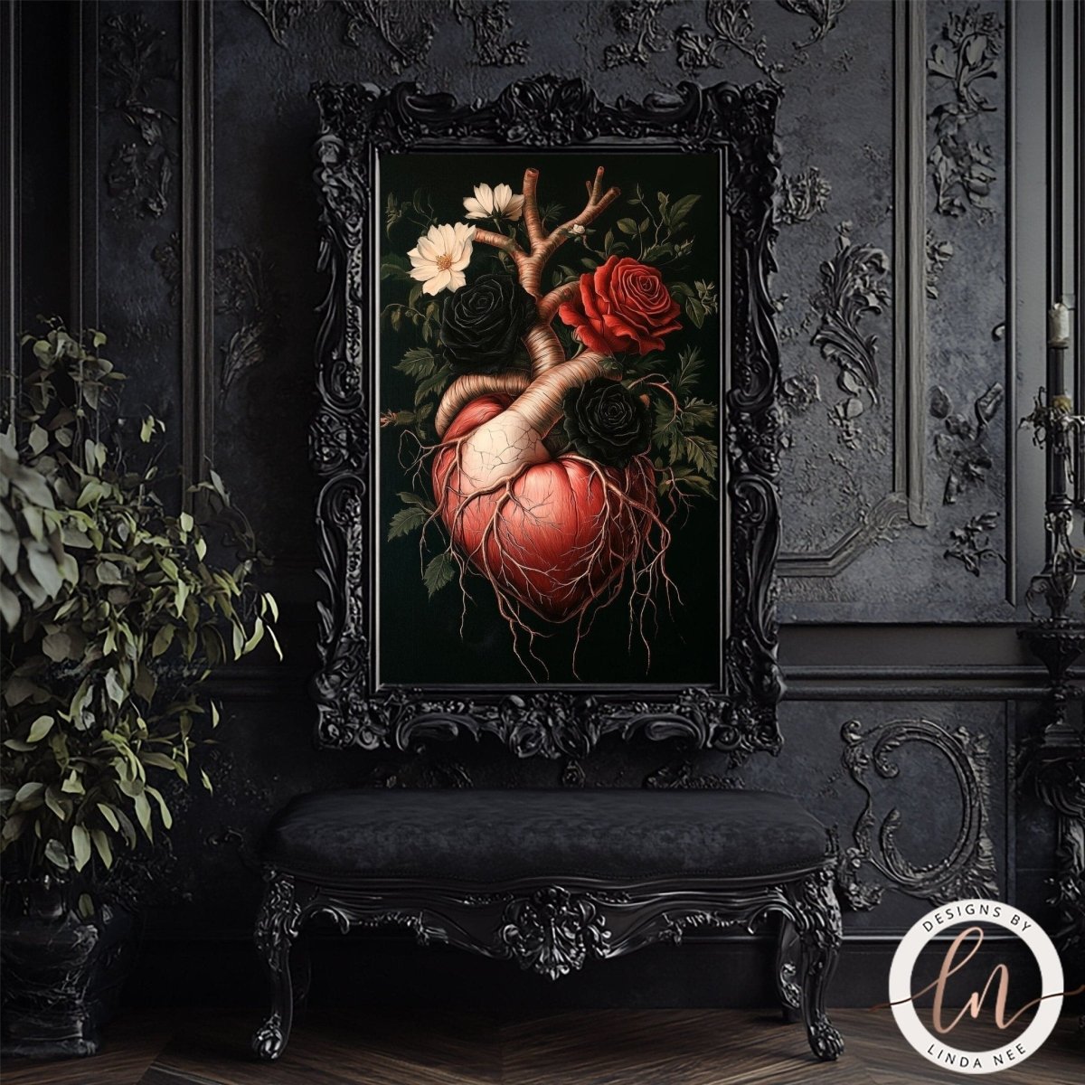 Anatomical heart with roses displayed in an ornate black frame