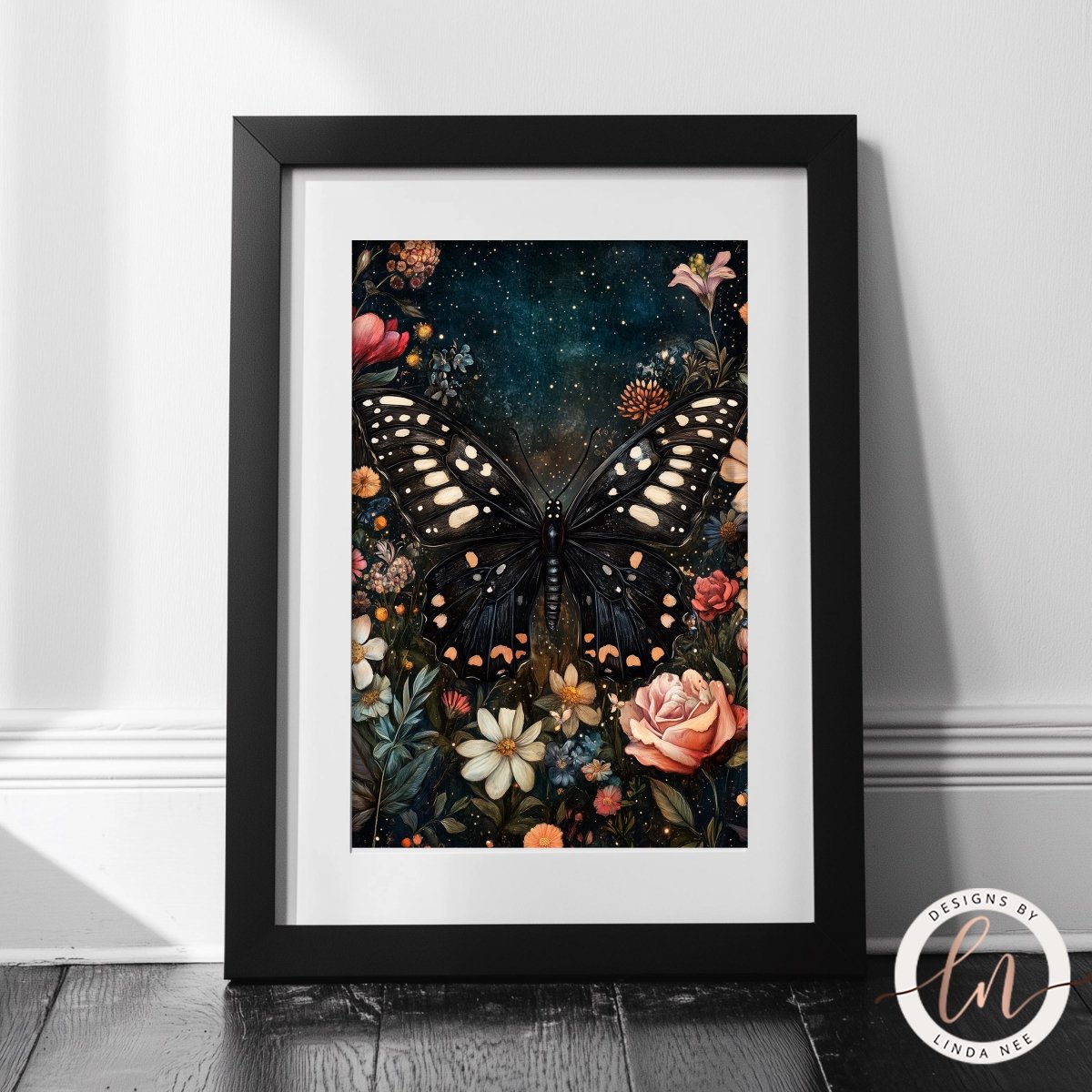 Black butterfly print displayed against a starry night sky background