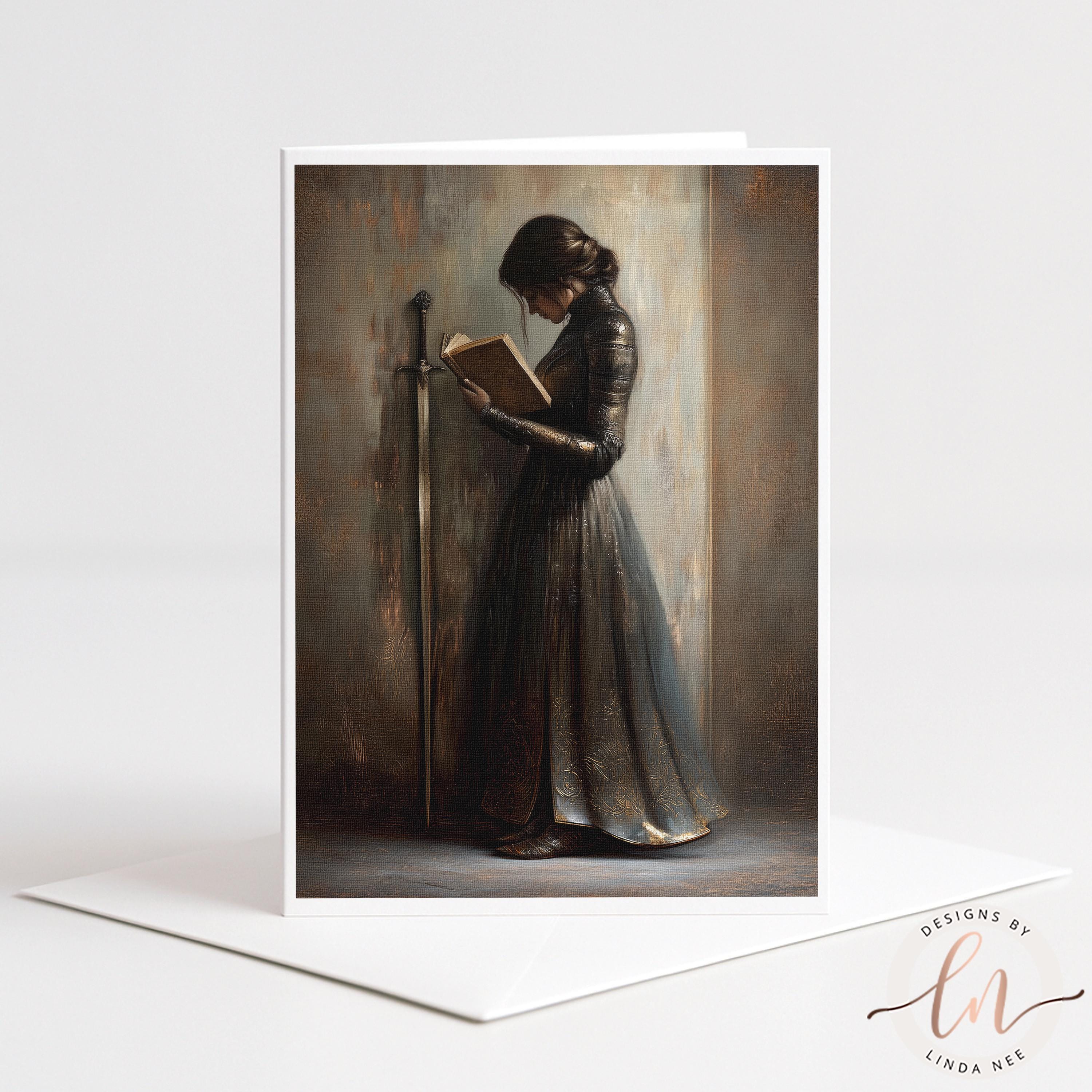 A woman in a long, flowing dress stands in a dimly lit room, engrossed in reading a book.