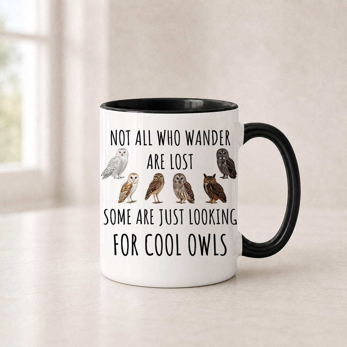 Cool owls mug in the 11 oz black handle version with a black interior, showing six owls in browns and grays