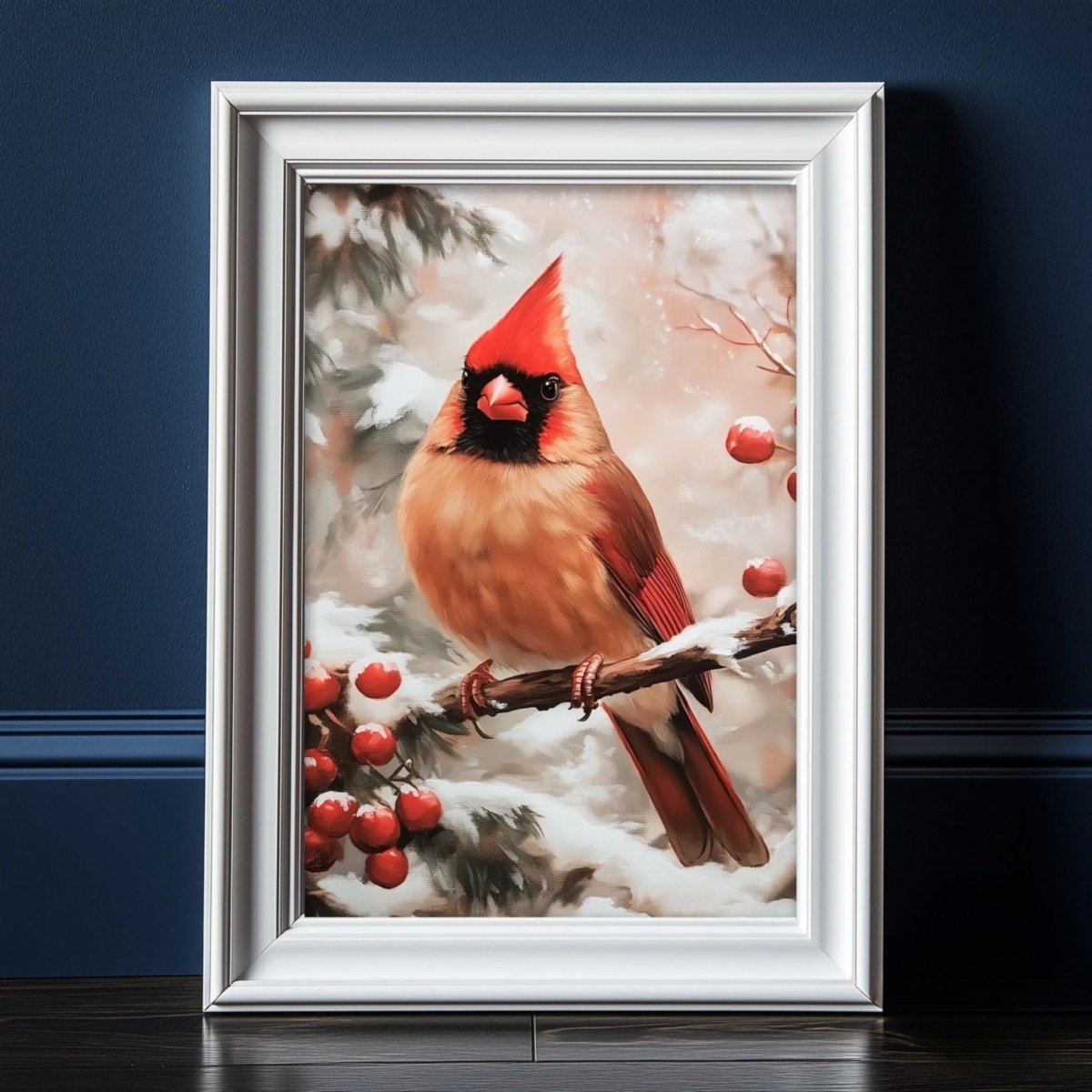 Red cardinal on a berry branch against snow, print shown in a wooden frame