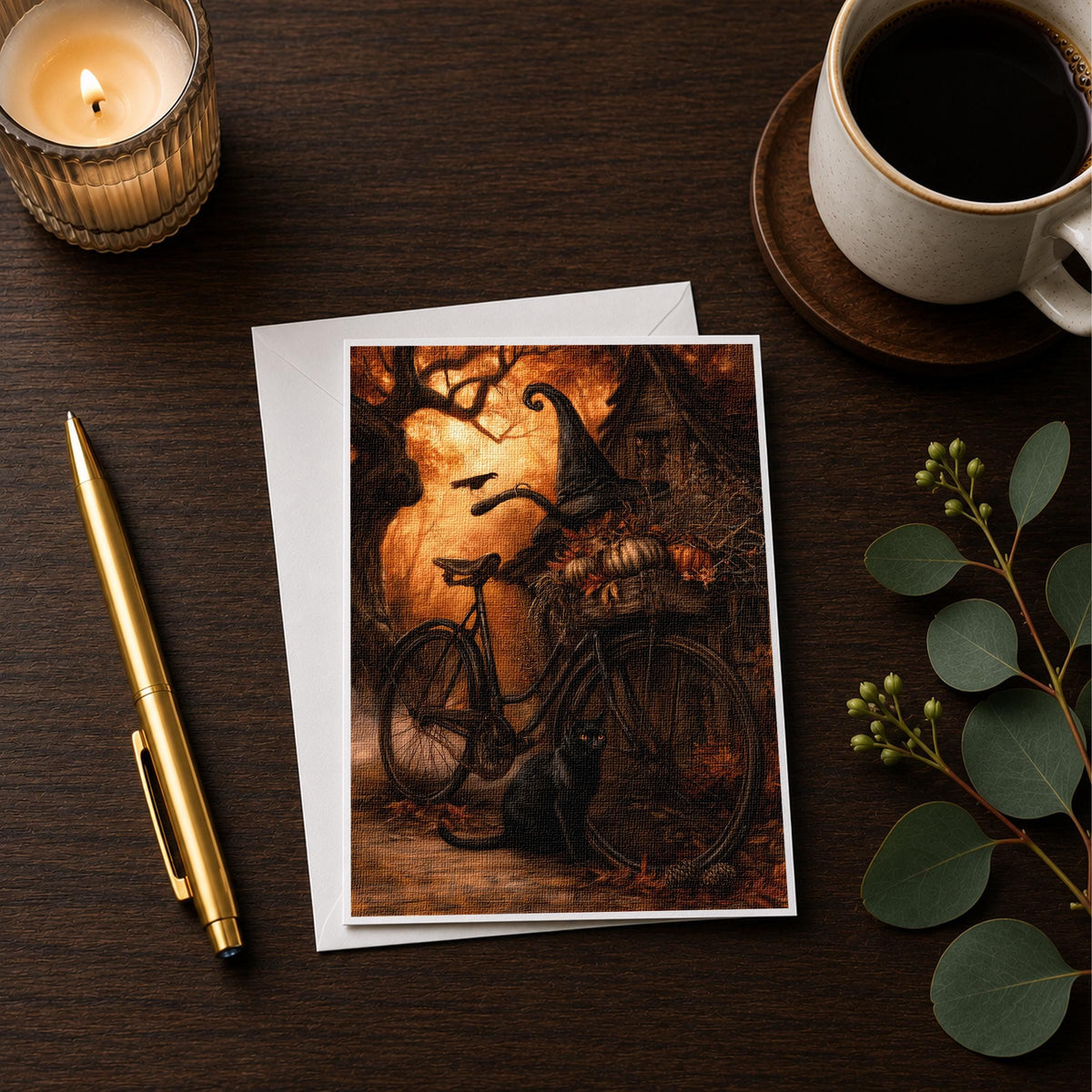 Autumn bicycle note card styled on a wooden desk with a candle, a pen and a coffee cup