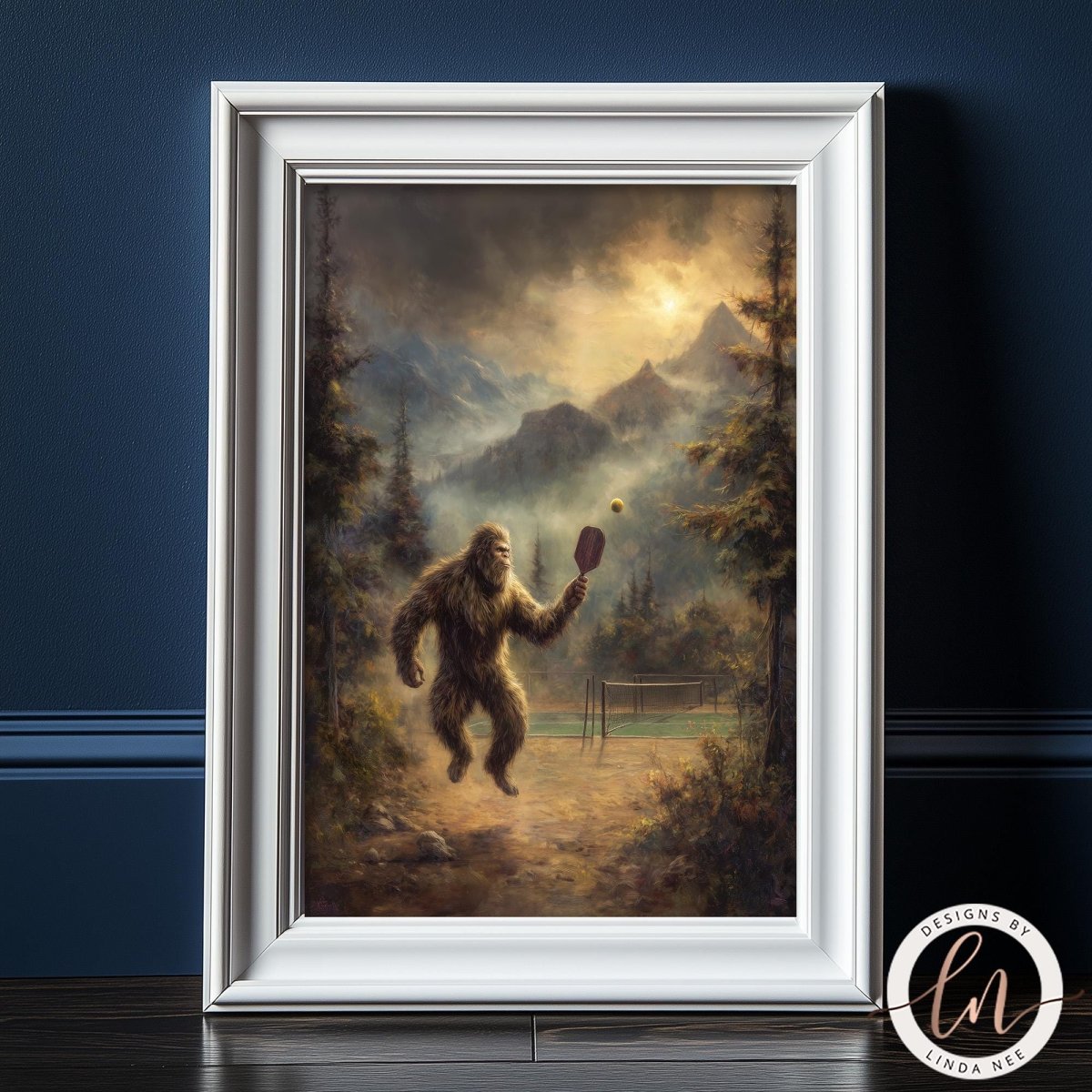 A framed painting depicting a large, furry creature resembling a Sasquatch or Sasquatch-like being, holding a paddle and standing on a dirt path in a forested area with mountains in the background.