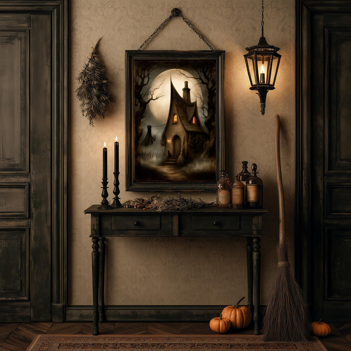 Halloween table with a lantern, candles, pumpkins, and a broom below the print