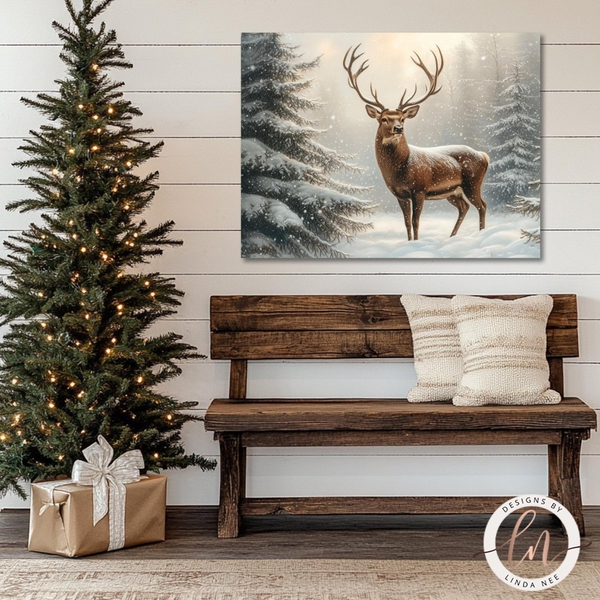 Snowy forest deer print above a wooden bench beside a lit Christmas tree