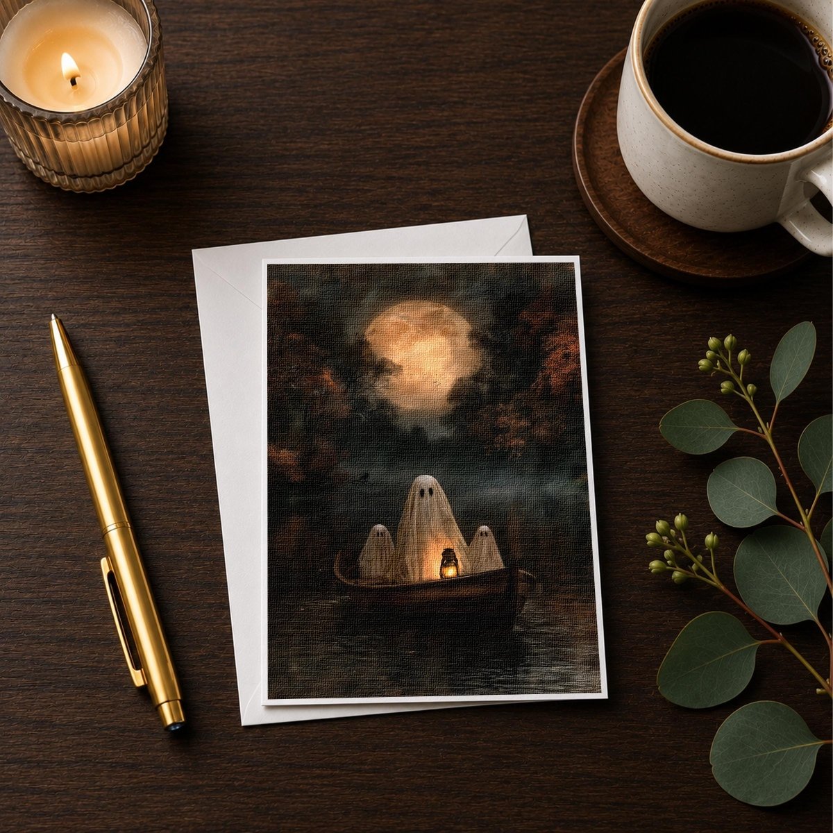 Ghost boat note card styled on a wooden desk with a candle, a pen and a coffee cup