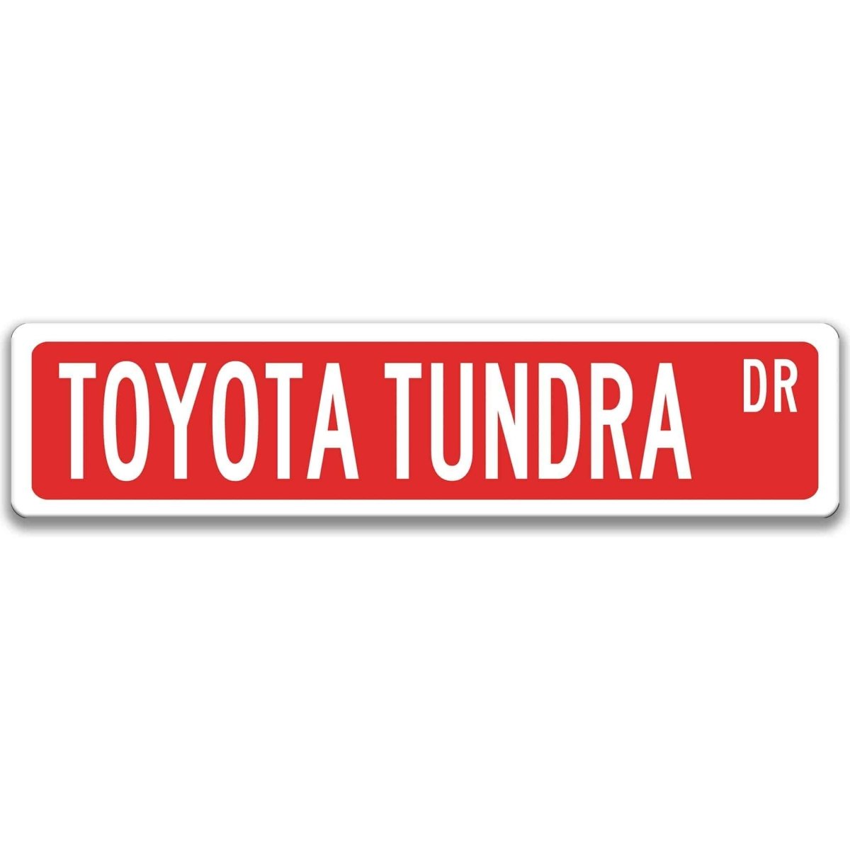 Red street sign with white border, white text reading TOYOTA TUNDRA DR