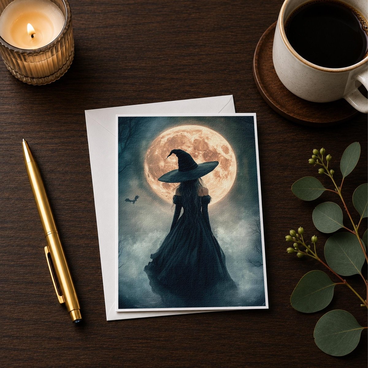 Halloween witch and bat note card styled on a desk with a candle and coffee