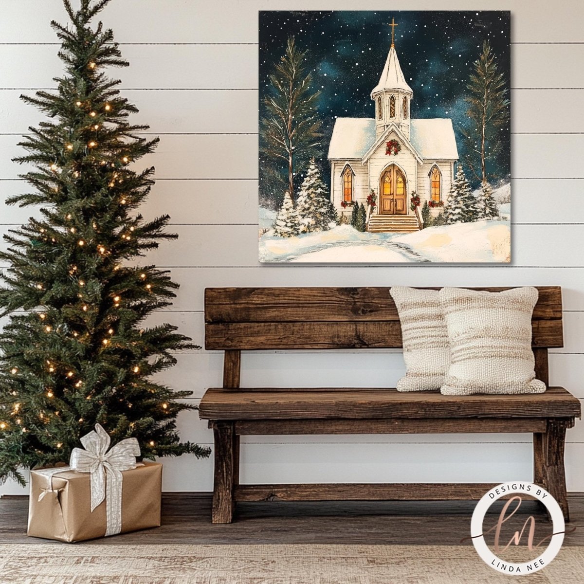 Snowy church print shown on a shiplap wall above a rustic wooden bench