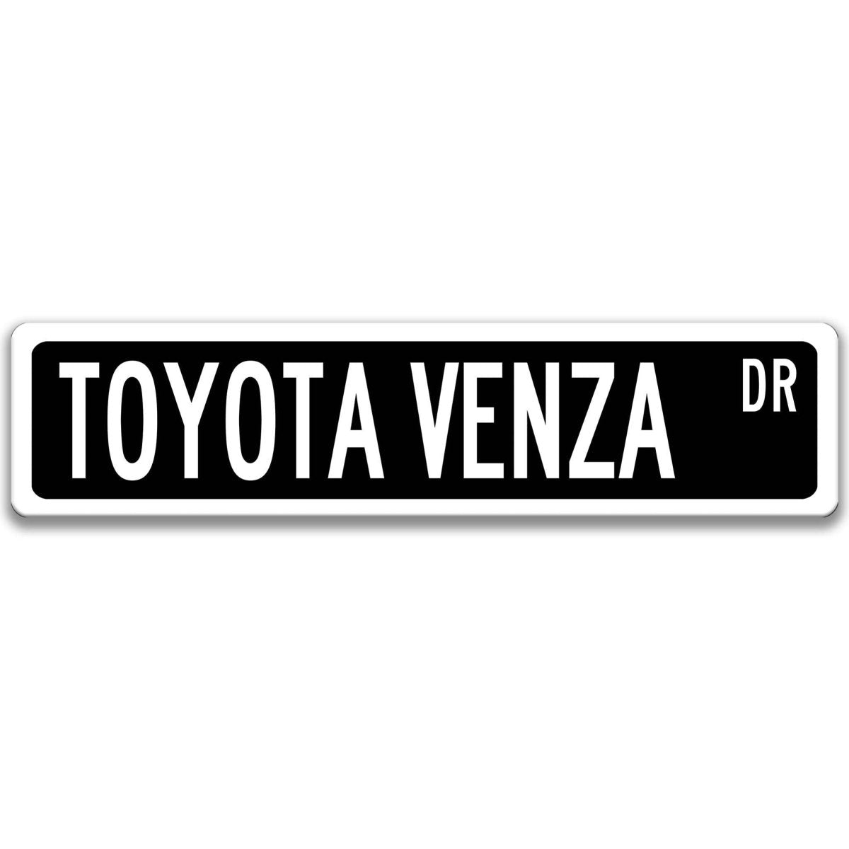 Black metal street sign with white text reading TOYOTA VENZA DR