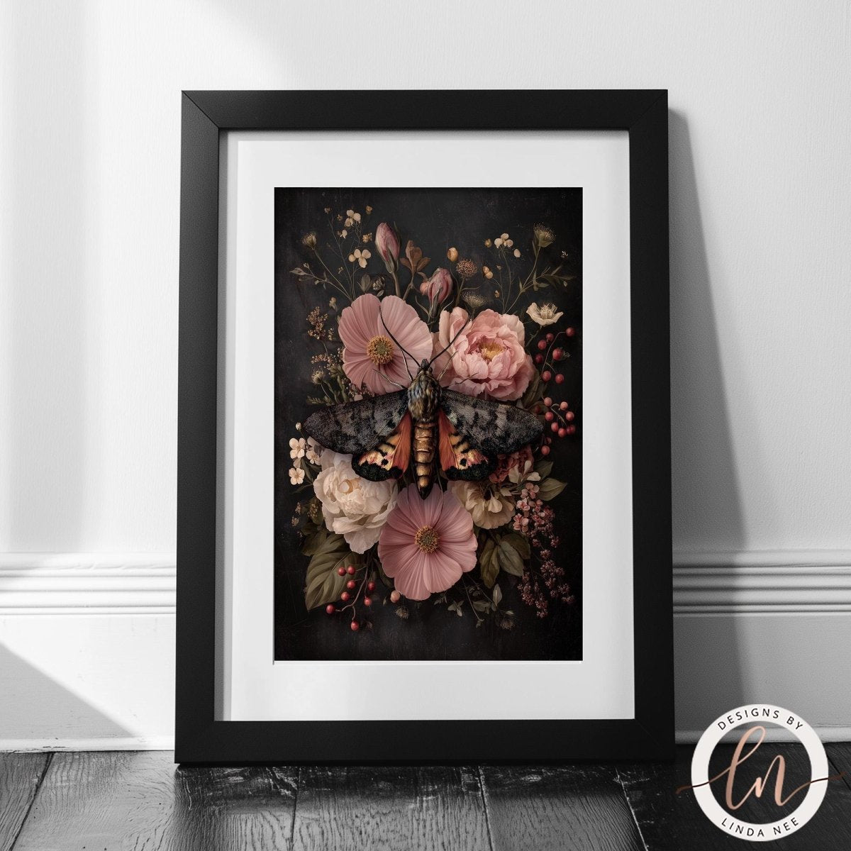A framed print depicting a butterfly resting on a floral arrangement of pink and white flowers.