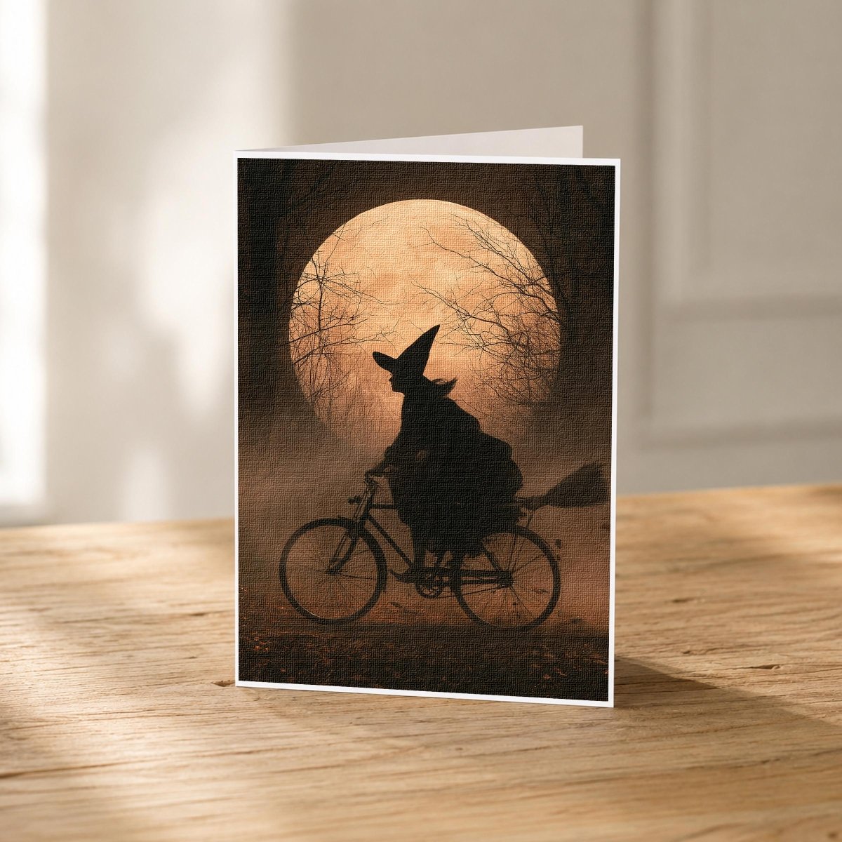 Witch on a bike orange moon 5x7 Halloween note card front