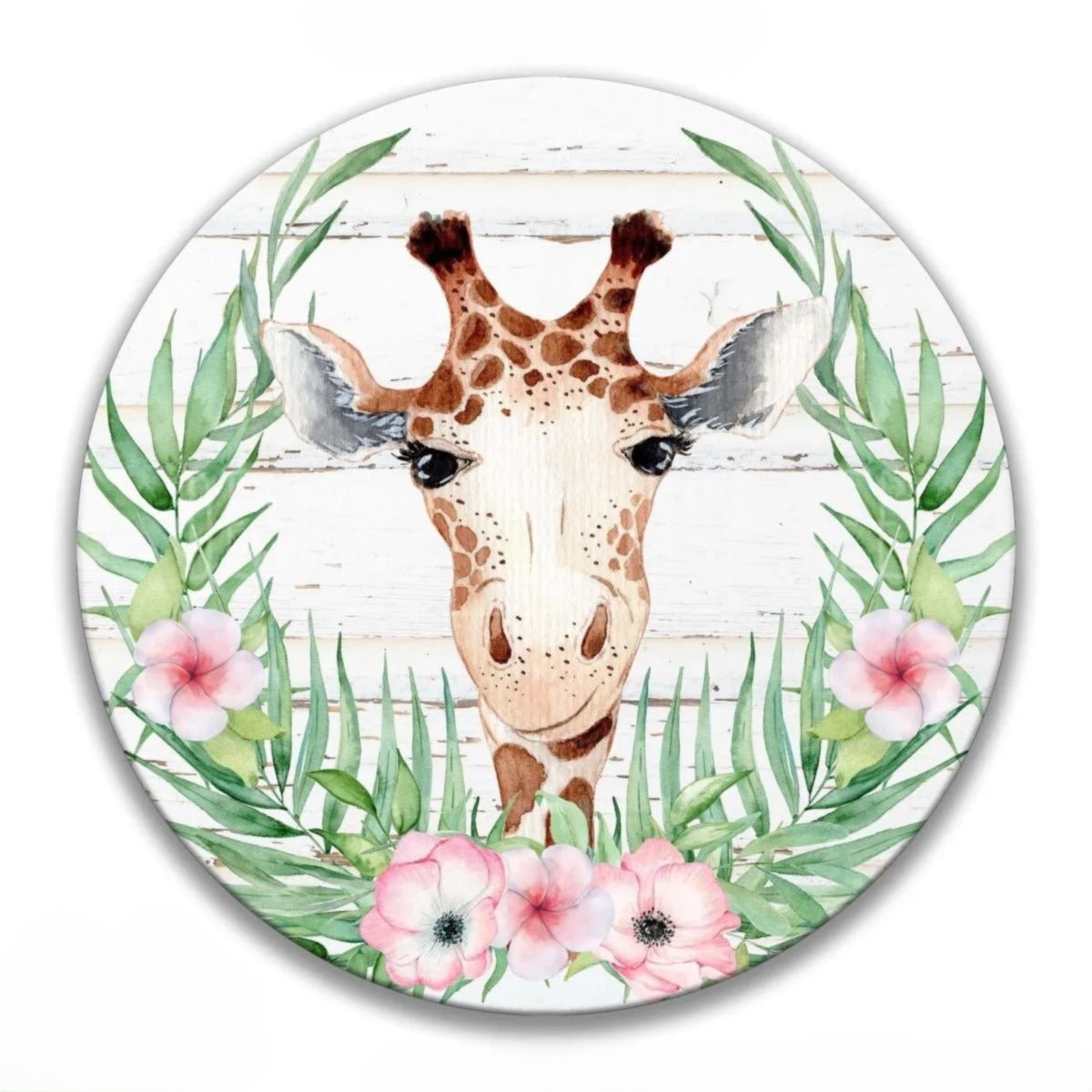 Round tropical giraffe wreath sign with a watercolor giraffe face framed by palm leaves and pink flowers.