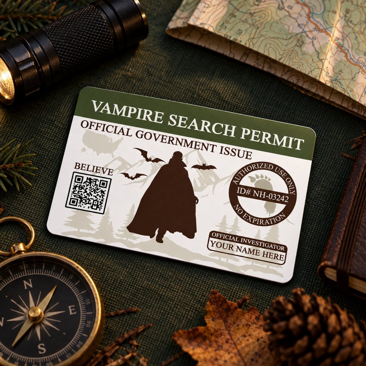 a Vampire Search Permit card with a silhouette of a person in a cape, surrounded by various objects such as a compass, a map, and pine needles.
