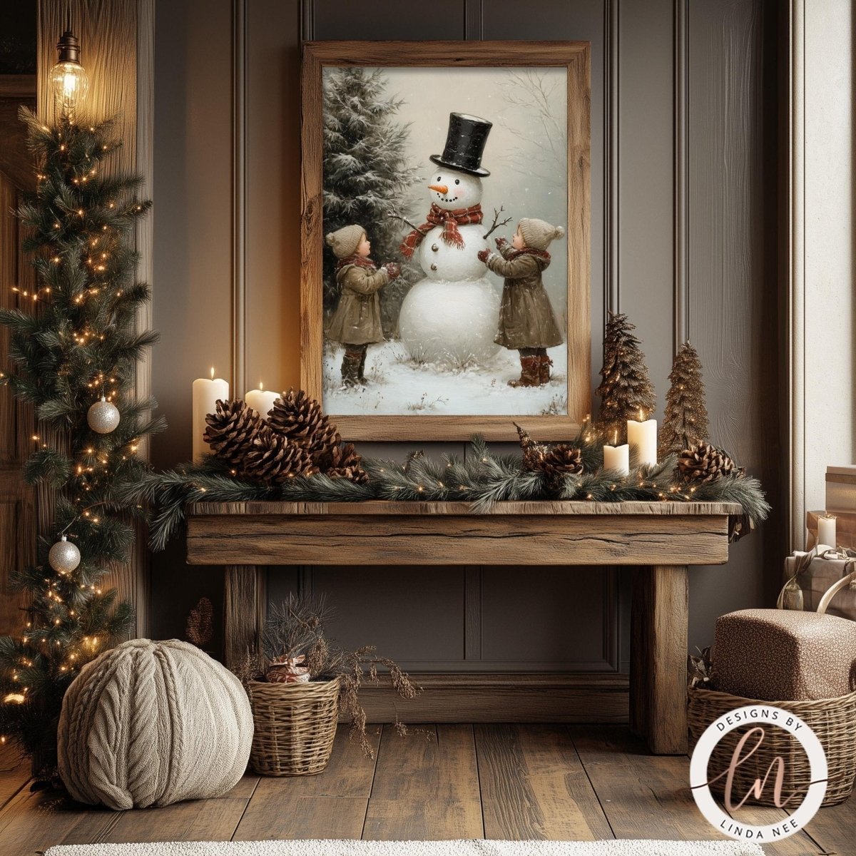 Snowman wall art print styled with pine cones, candles and a small tree