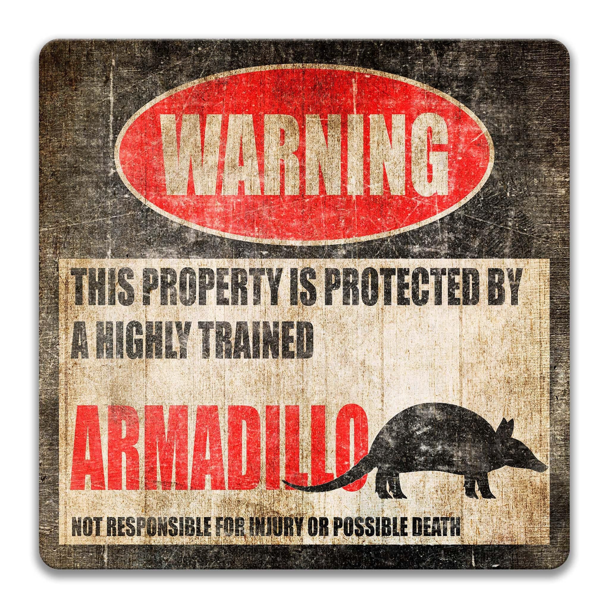 a warning sign that says "Armadillo" and "This property is protected by a highly trained" in bold text.
