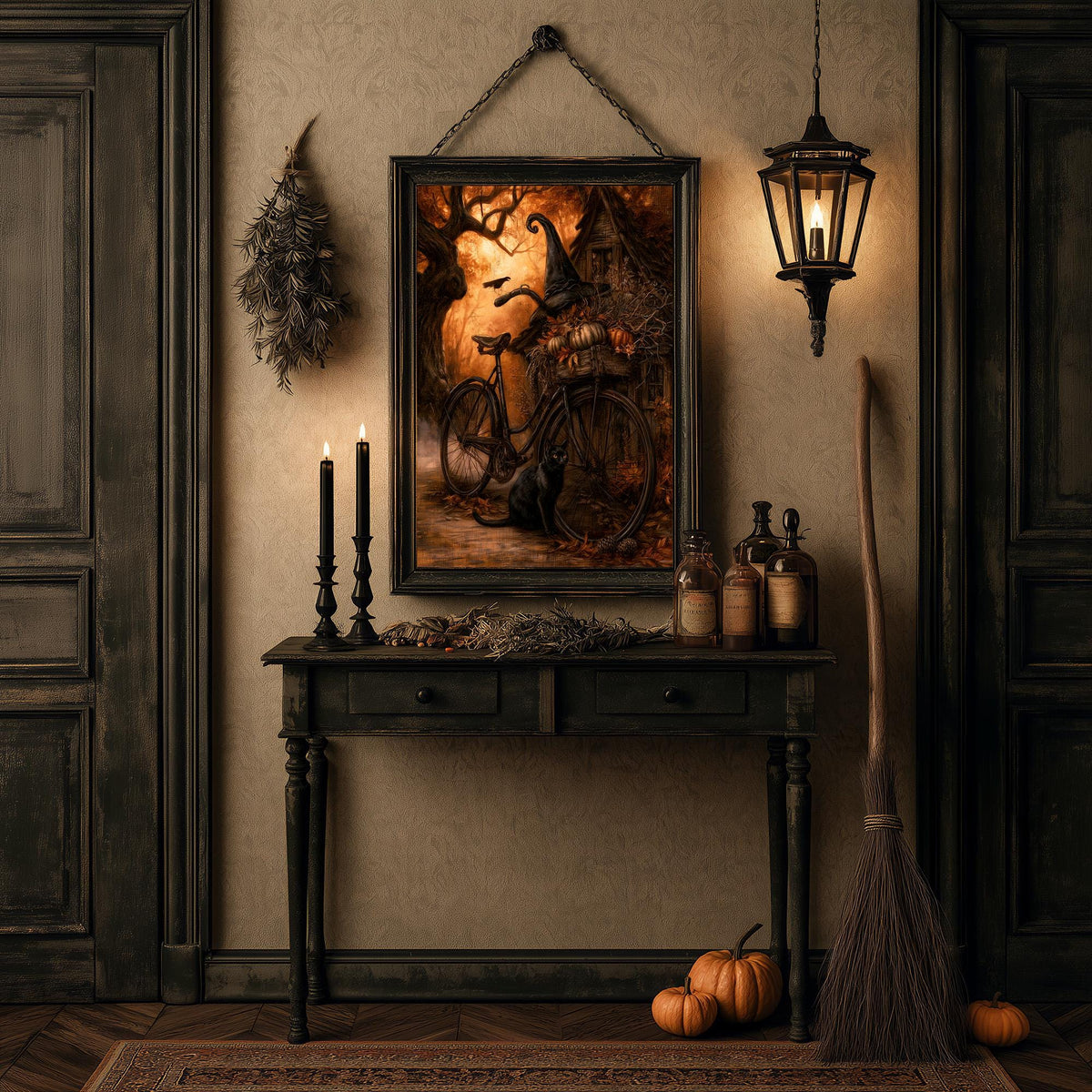 Halloween styling with the bicycle art print above a black table of candles, pumpkins, and a broom