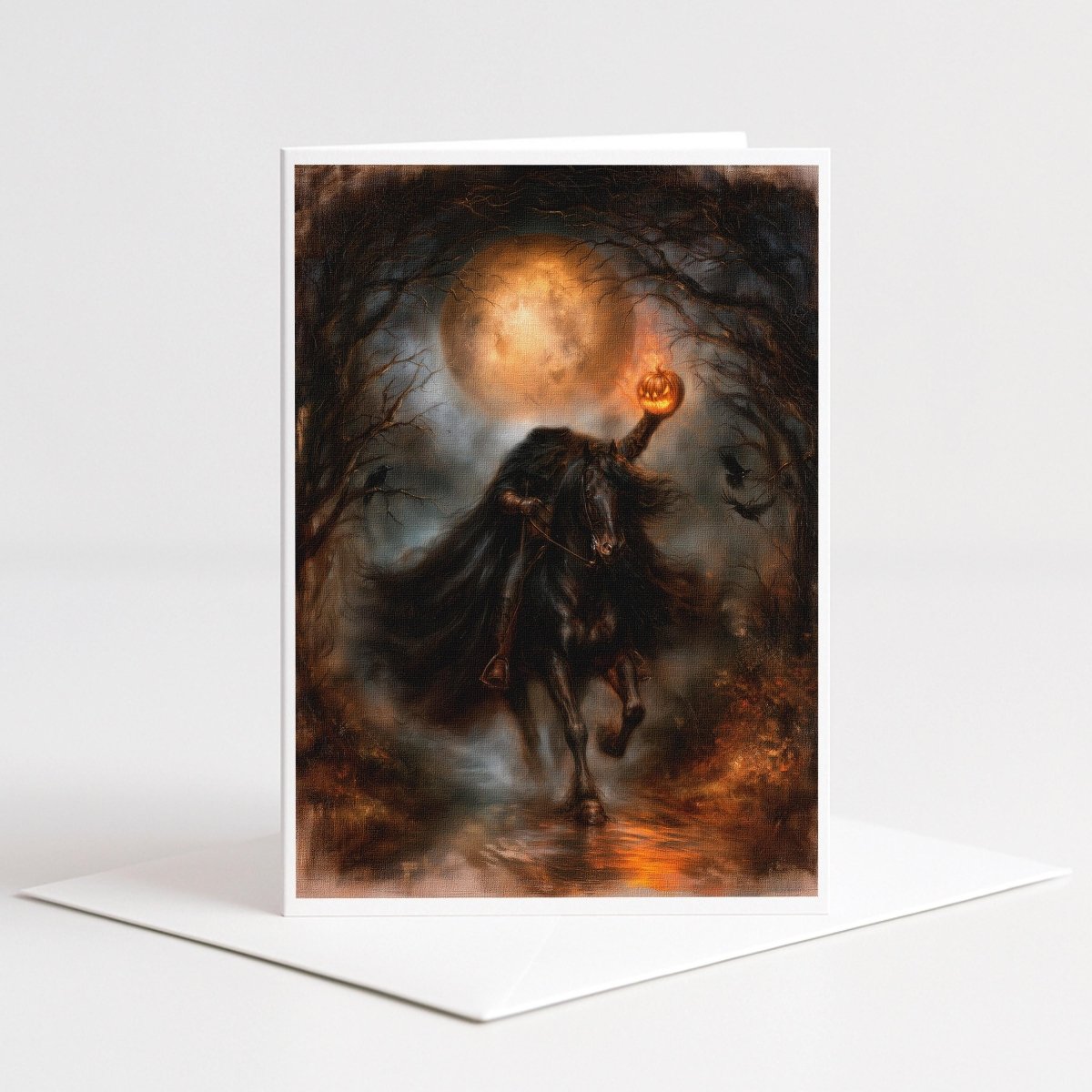 Cloaked rider on a black horse holding a glowing jack o lantern in moonlit woods, 5x7 note card