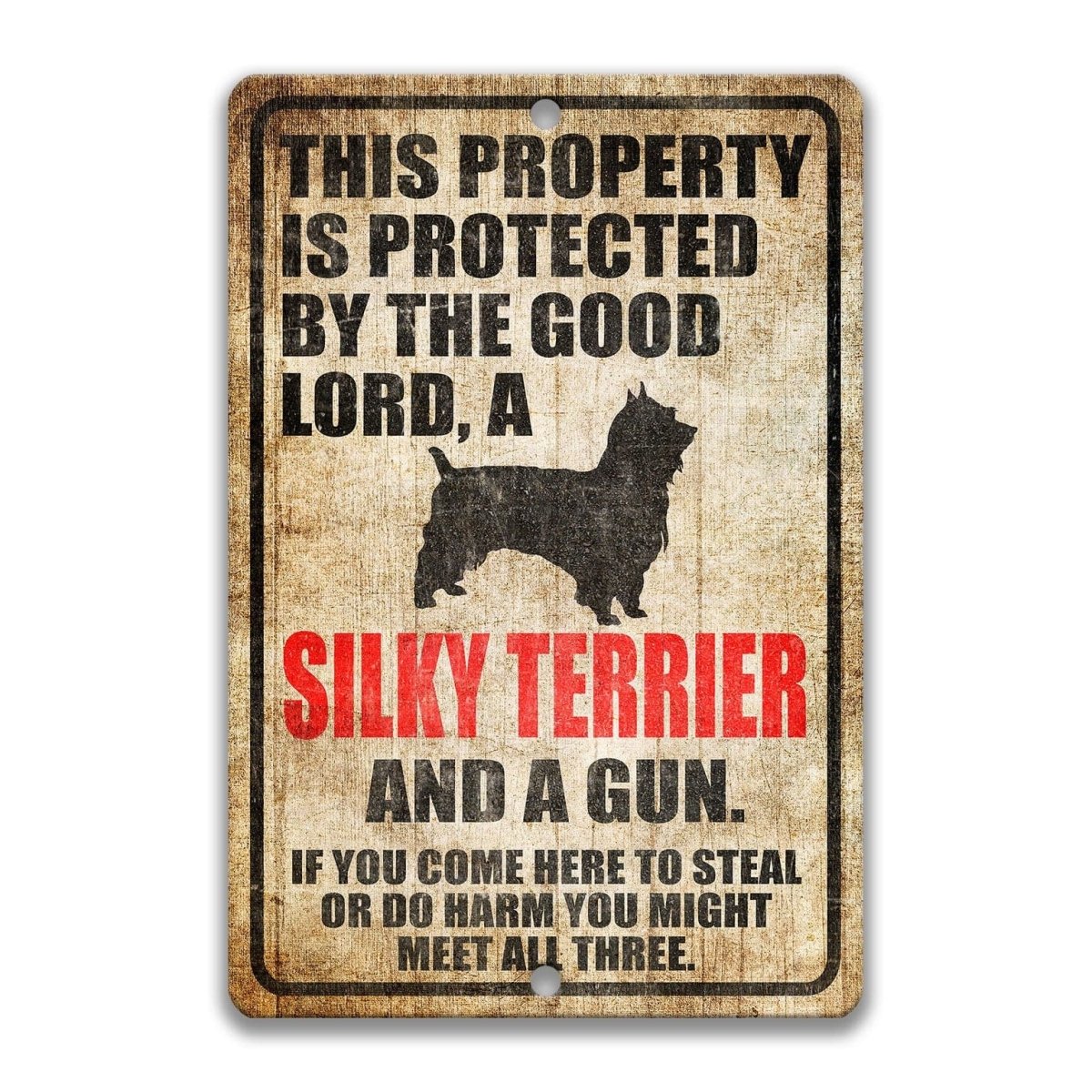 The image is a sign that reads "This property is protected by the good Lord, a Silky Terrier and a gun. If you come here to steal or do harm, you might meet all three."