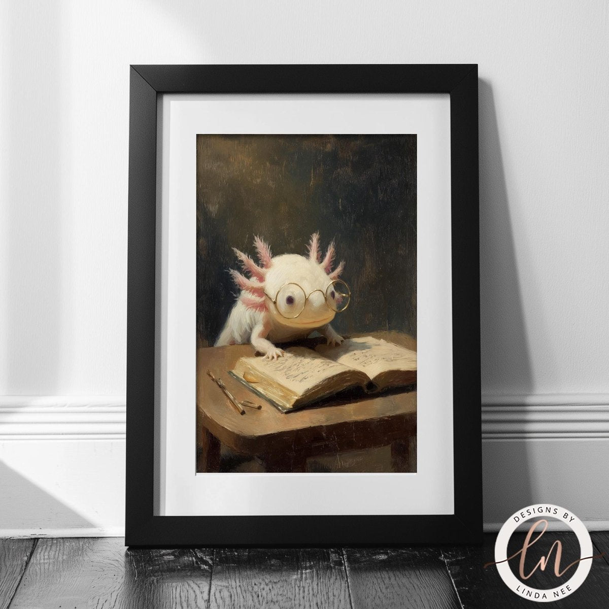 A framed painting depicting a small amphibian, possibly a salamander or lizard, sitting at a desk and reading a book.