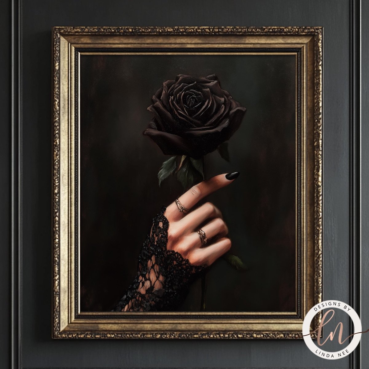 Framed artwork of a hand holding a black rose against a dark background