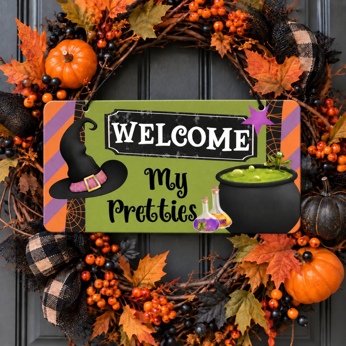 Welcome My Pretties sign centered in a door wreath