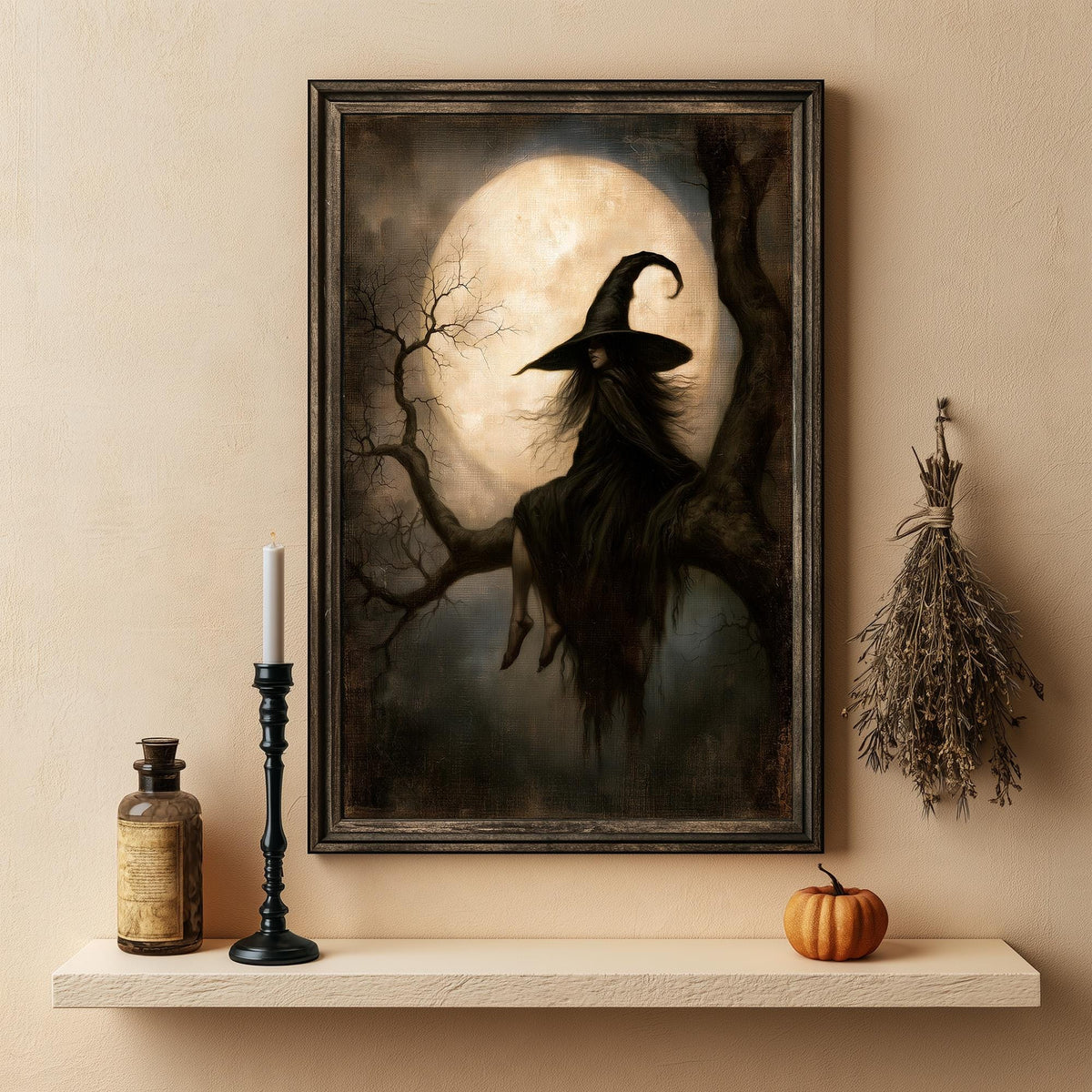 Witch in the branches artwork above a shelf holding a lit candle and a gourd