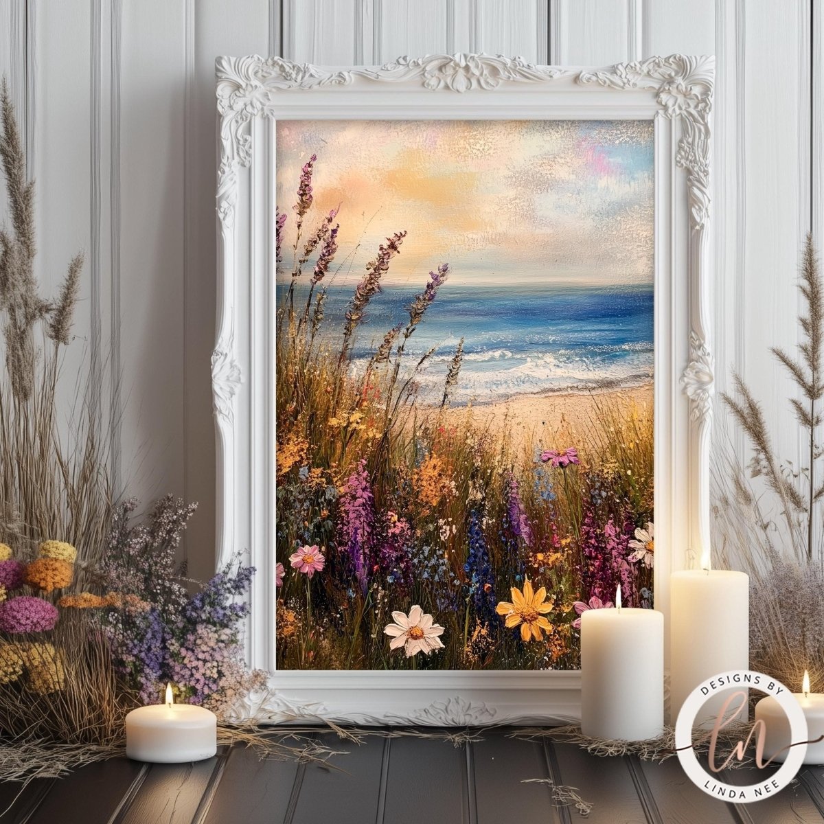 a framed painting of a vibrant coastal landscape with a field of colorful wildflowers and a serene ocean view.