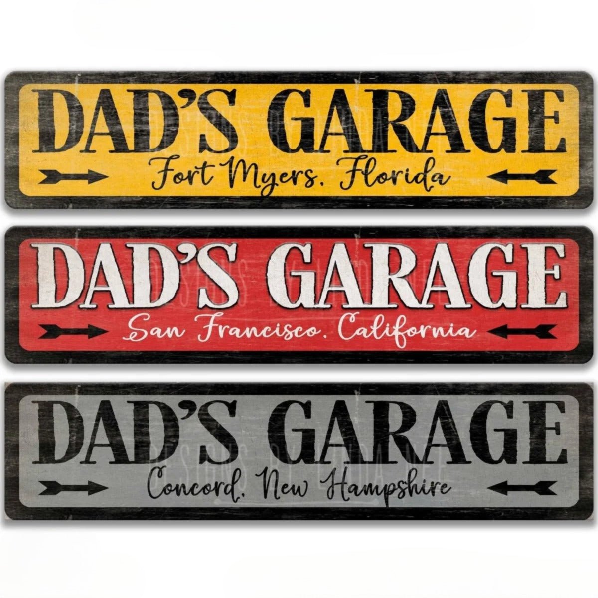 three rectangular signs with the same design, each featuring the text "DAD'S GARAGE" in a different color and font style. The signs are made of a material that appears to be aluminum and are coated with a UV protective coating.