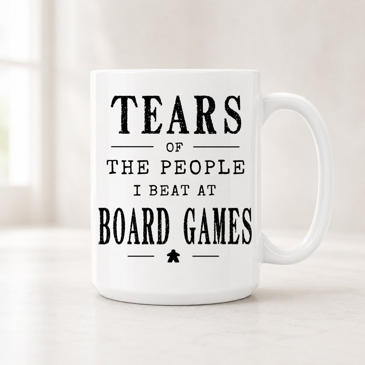 15 oz Tears of the People I Beat at Board Games mug with bold black vintage lettering and a small star icon