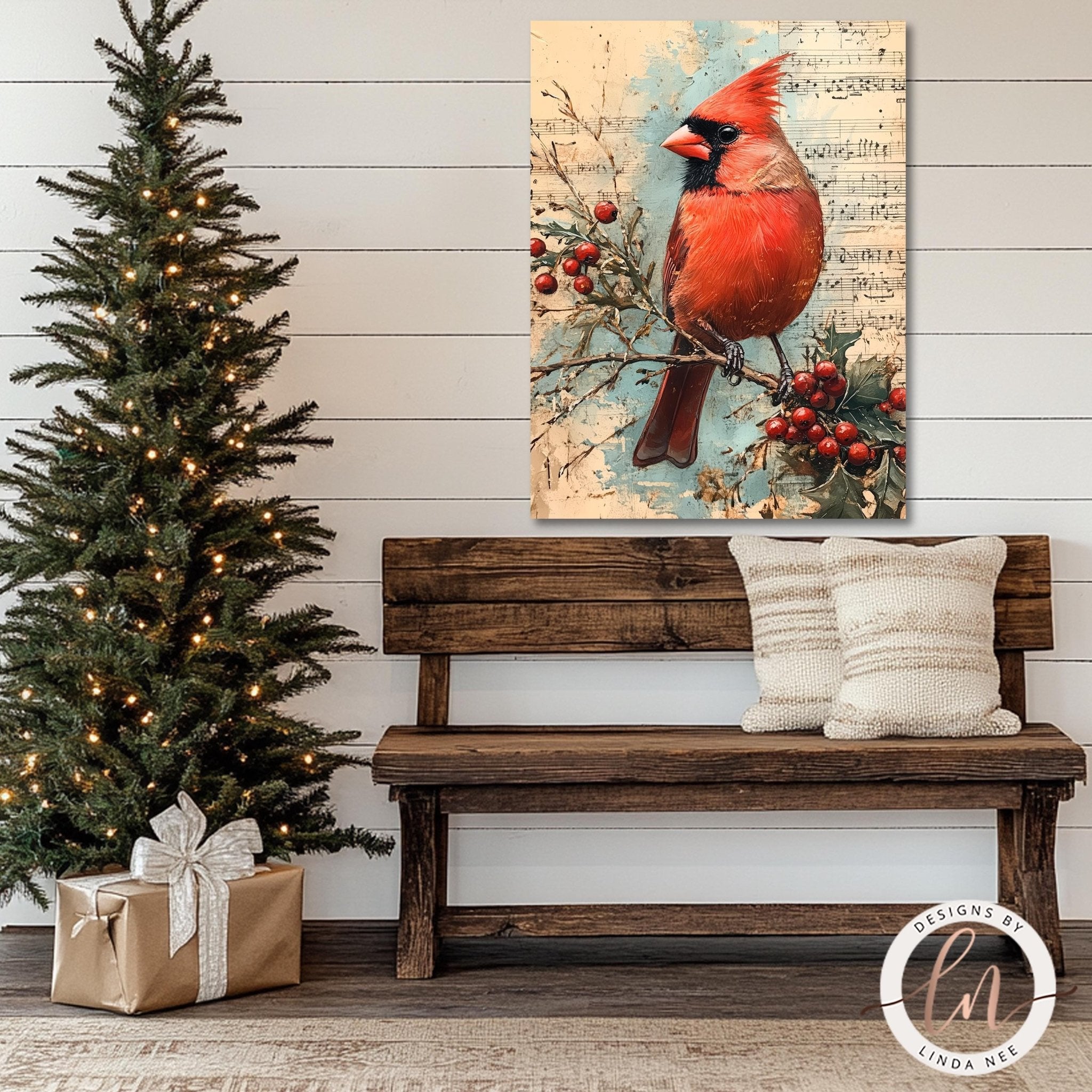 a wooden bench with a white pillow and a brown gift box with a white bow, situated next to a Christmas tree decorated with twinkling lights. Above the bench, there is a framed painting of a red cardinal perched on a branch with berries.