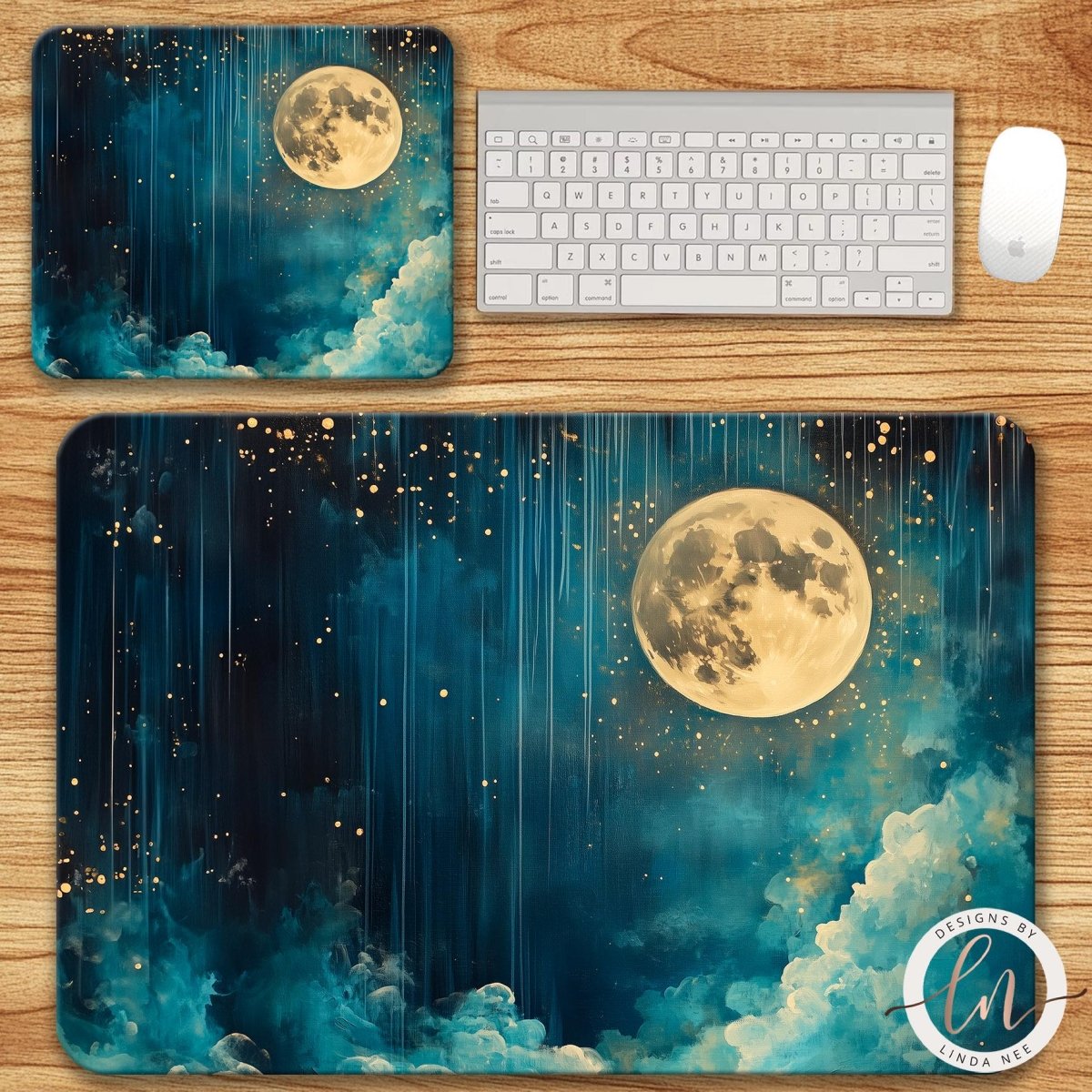 a desktop computer setup with a keyboard and mouse on a wooden surface. The keyboard and mouse are positioned next to a mouse pad with a night sky scene, including a full moon and stars. The mouse pad also has a design depicting a night sky with a full moon and stars.
