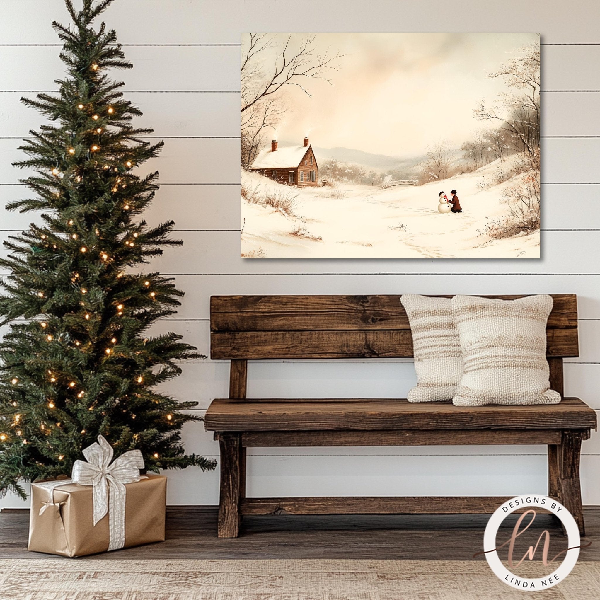 a cozy Christmas scene with a lit Christmas tree, a wooden bench, and a painting of a snowy landscape above it.
