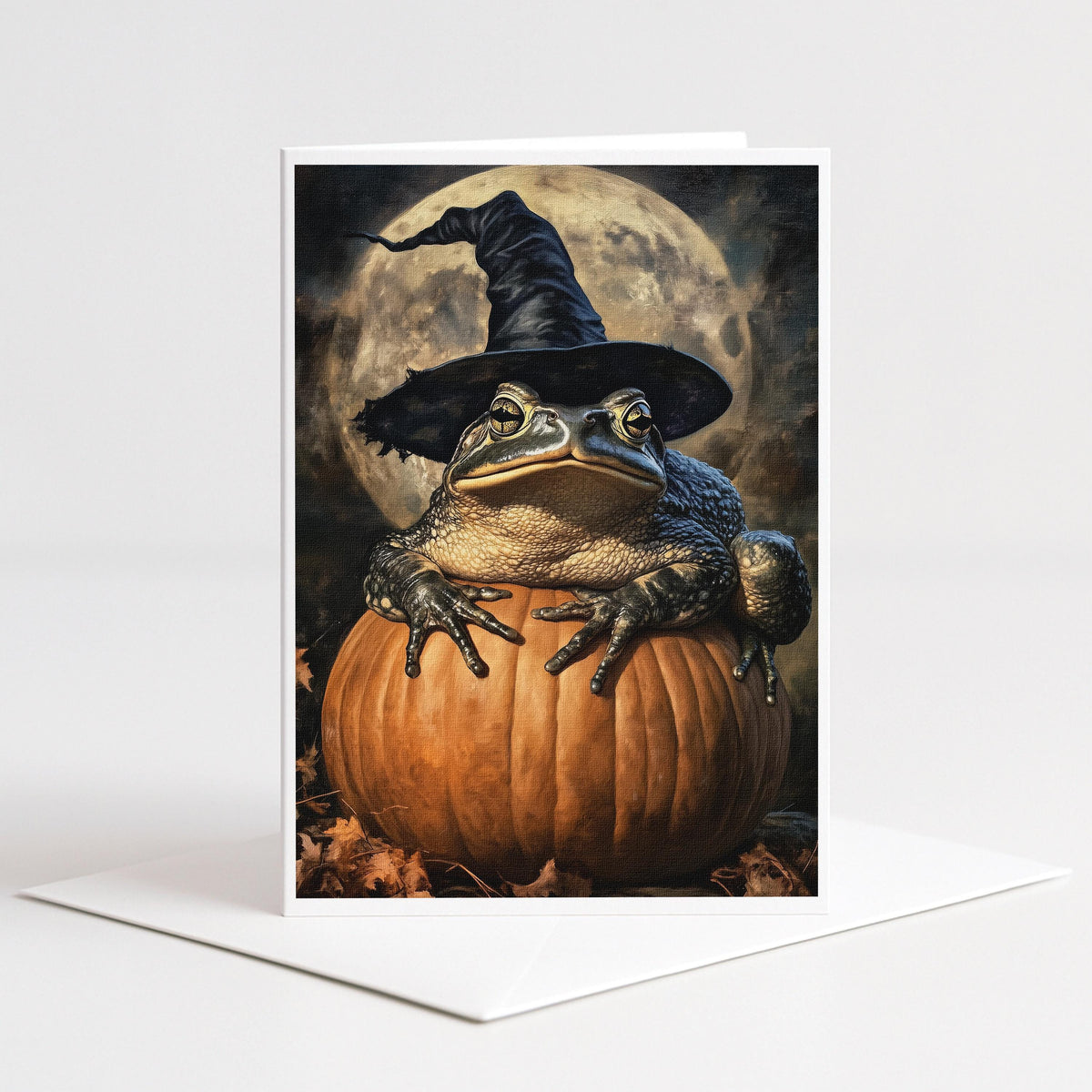 Toad wearing an oversized witch hat on a pumpkin under a full moon, 5x7 blank note card